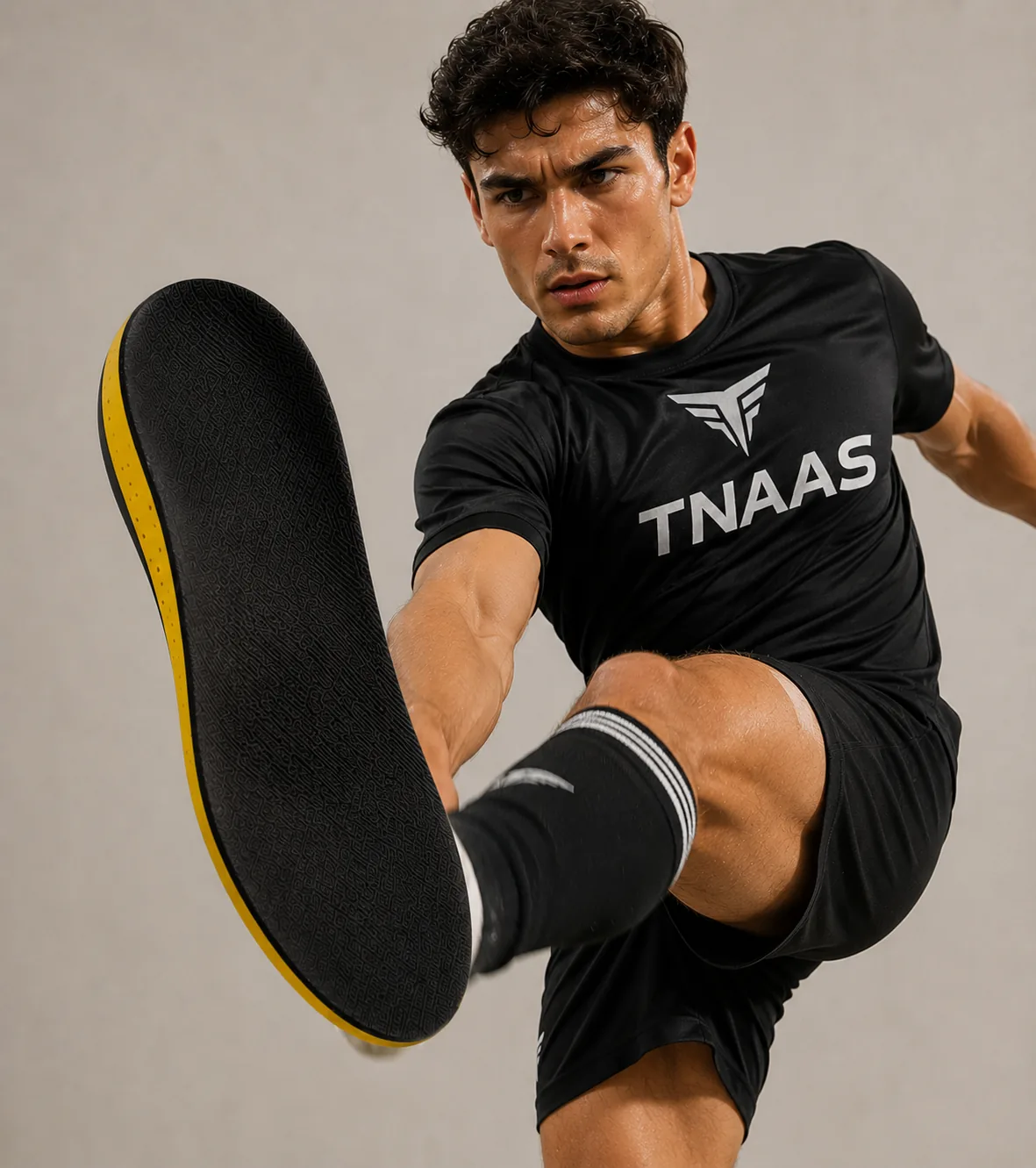 Tennis player wearing TNAAS insoles for court movement support